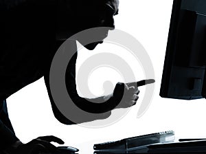 One business man silhouette computing computer angry displeased photo