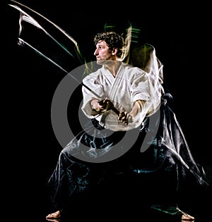 Iaido Kenjutsu budoka man isolated black background photo