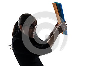 Business woman shielding behind folders files silhouette