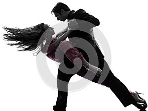 Couple man woman ballroom dancers tangoing silhouette photo