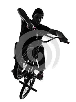 Man bmx acrobatic figure silhouette