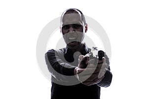 One caucasian man holding gun portrait silhouette