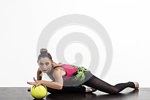 One caucasian woman exercising fitness ball isolated on white background, copy space.