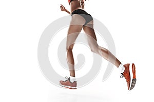 One caucasian woman running on white background