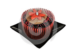 One chocolate cupcake with red icing