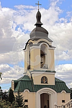 one Christian church with dome and cross
