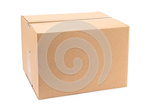 One closed cardboard box on white