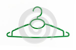 One colored plastic hanger, isolated on white background, close-up