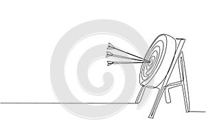 One continuous line drawing of arrows was shot bullseye to archery target, side view. Archery sport training and exercising