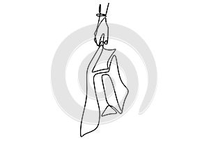 One continuous line drawing female hand holding shopping bags isolated on white background. Shopping in mall and eco friendly