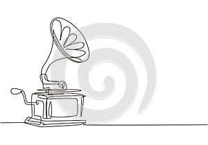 One continuous line drawing of old retro analog gramophone with vinyl desk. Antique vintage music player concept. Musical