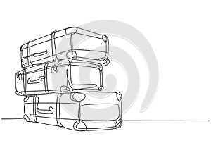 One continuous line drawing of old retro vintage leather suitcases stack. Classic travelling item concept single line draw graphic