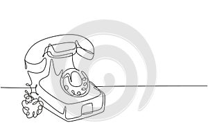 One continuous line drawing of old vintage antique analog desk telephone to communicate. Retro classic telecommunication device