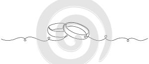 One continuous line drawing of Wedding rings. Romantic concept and symbol proposal engagement and love marriage in