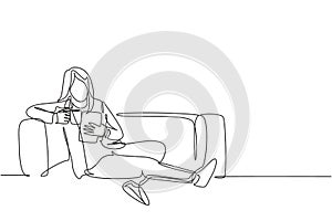 One continuous line drawing of young businesswoman lying down on the sofa while reading book and holding a cup of coffee drink.