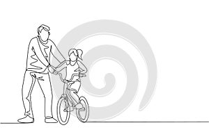 One continuous line drawing of young father help his daughter learning to ride a bicycle at countryside together. Parenthood