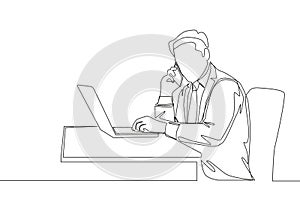 One continuous line drawing of young manager typing on laptop during receiving phone call from his staff at the office