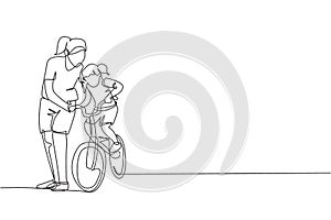 One continuous line drawing of young mother help her daughter learning to ride a bicycle at countryside together. Parenthood