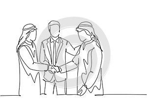 One continuous line drawing of young muslim business man handshake his colleague. Saudi Arabian businessmen with shemag, kandura,