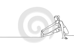 One continuous line drawing of young sporty woman working out stretching pull toes leg in fitness gym club center. Healthy fitness
