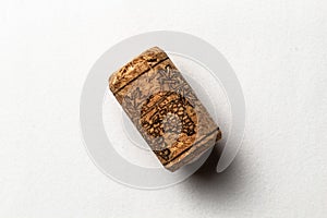 One cork stopper for wine bottle over white background