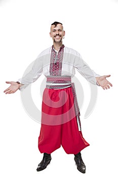 One Cossack in white background. Isolated, costume, uniform, warrior, historical, trousers.