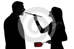 One couple man and woman tasting cooking sauce pan