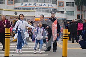 One day after school, students go out of the school gate