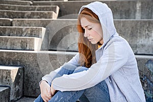 One depressed young woman feeling negative feelings