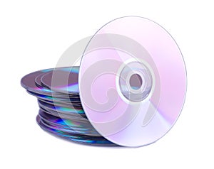 One disc and stack of CDs