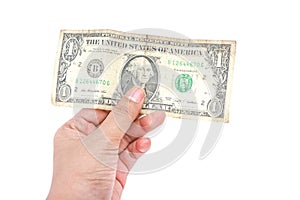 One dollar banknote in hand on white background,