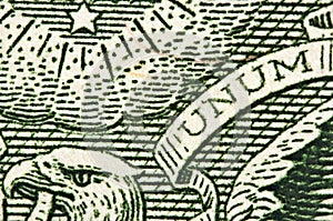 One-dollar bill, Head of an eagle a word UNUM. Macro photo