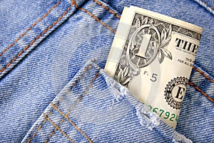 One Dollar Bill in Jeans Pocket