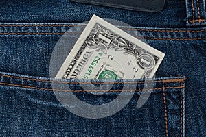 One dollar bill in the pocket