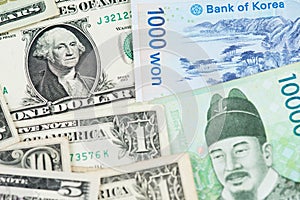 One Dollar Bill and South Korea Won Banknotes close up image
