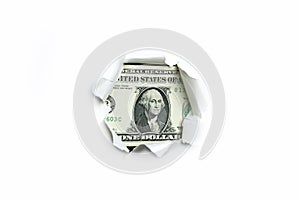 One dollar in a hole on a white background.