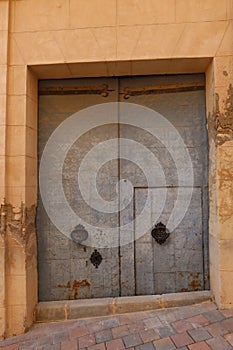 One of the doors of the San Lorenzo Martir Church, 16th century. Busot, Alicante, Spain photo