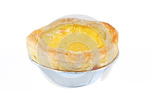 One egg tart on foiled container isolated on white