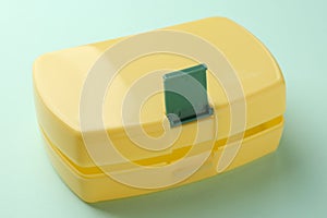 One empty lunch box on light blue background