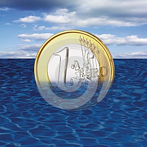 One euro coin drowning in sea, close-up