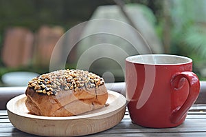 one glass of hot chocolate and one slice of brown bread