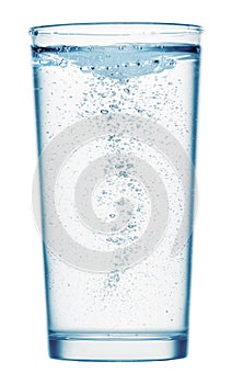One glass of sparkling water on a white background, isolated object