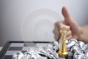 Only one gold King chess can stand in the group of falling silver chess concept business win victory