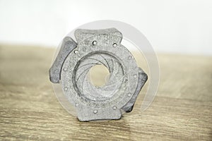 One gray model camera shutter printed on 3D printer Object printed on 3D printer