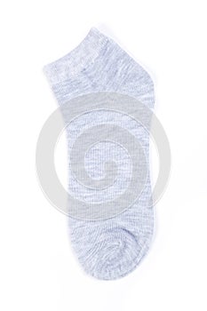 One gray new short sock on white background, top view