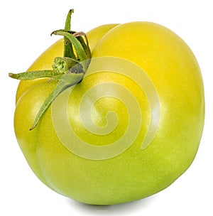 One green tomato on the side