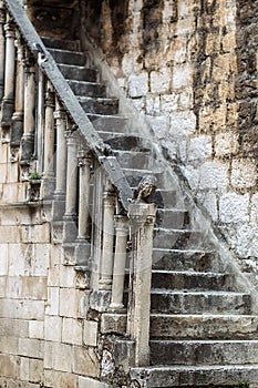 One grunge moldering masonry staircase