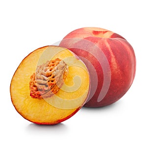 One and half red peach isolated on white