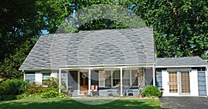 One and a Half Story Home with Porch Swing