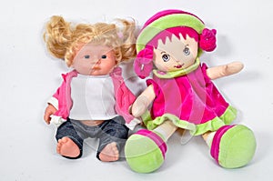 One is handmade, one is plastic toy dolls